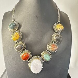 Stunning statement stone necklace in silver tone metal!